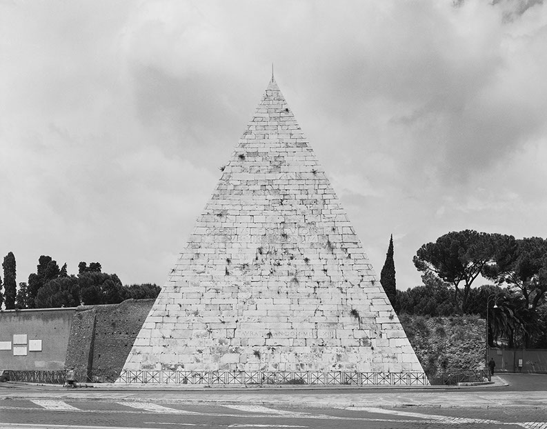 A photograph from John Riddy's series 'Rome' of the pyramid of Cestius